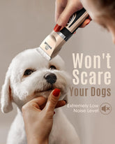 A person using a MundoPeludo! quiet dog grooming clipper on a white dog&
